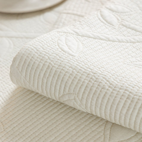 Slipcover KAS™ Floral Cotton Quilted Sofa Cover, Non-Slip Couch Protector with Scalloped Edges