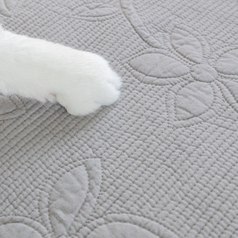 Slipcover KAS™ Floral Cotton Quilted Sofa Cover, Non-Slip Couch Protector with Scalloped Edges