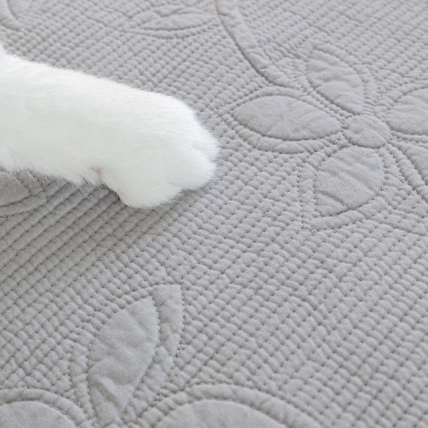 Slipcover KAS™ Floral Cotton Quilted Sofa Cover, Non-Slip Couch Protector with Scalloped Edges